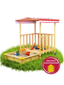 Spielhaus mit Sandkasten und Spielveranda in Natur